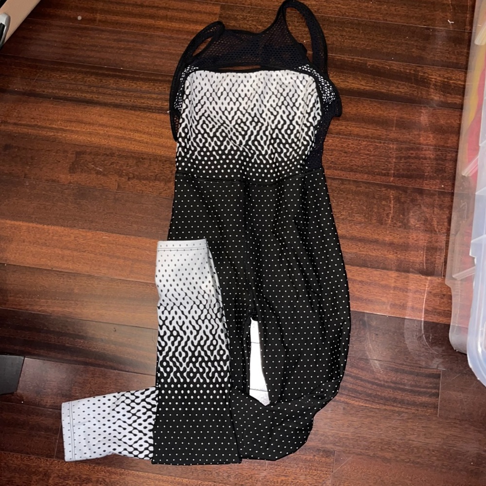 An ONA black & White jumpsuit gently used. Sexy